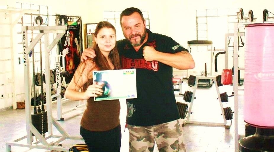 Mariana Faria e Roberto Thomaz, que é seu mestre na parte de arbitragem - Reprodução/Facebook