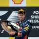Sebastian Vettel recebe troféu no pódio após vencer o GP da Bélgica de F1 - AFP PHOTO / JOHN THYS