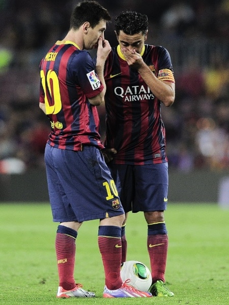 Messi e Xavi, dois casos de sucesso da base do Barcelona - AFP PHOTO/ JOSEP LAGO