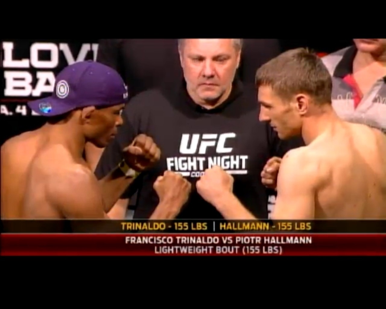 3.set.2013 - Brasileiro Francisco Massaranduba encara o polonês Piotr Hallmann pelo peso leves do UFC BH - Reprodução