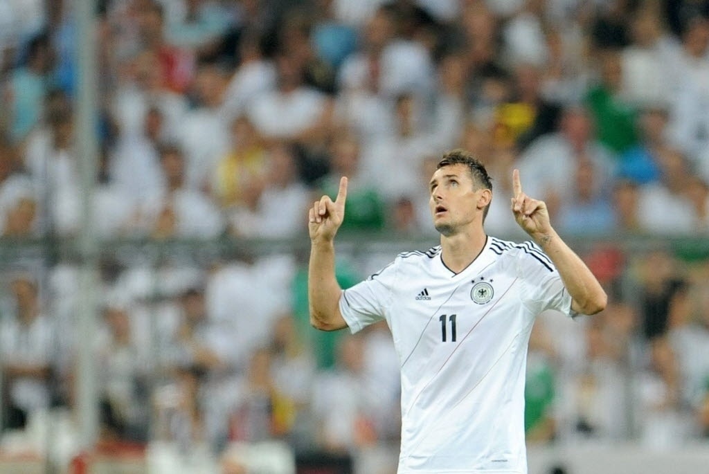 06.set.2013 - Miroslav Klose comemora após abrir o marcador para a seleção da Alemanha contra a Áustria pelas Eliminatórias Europeias da Copa do Mundo