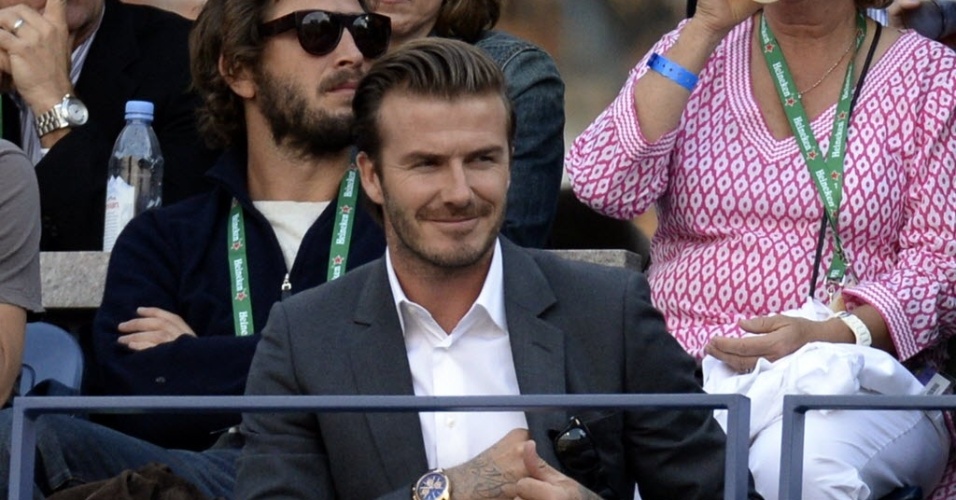 09.set.2013 - Ex-jogador de futebol britânico David Beckham assiste ao jogo entre Djokovic e Nadal na decisão do Aberto dos Estados Unidos de 2013