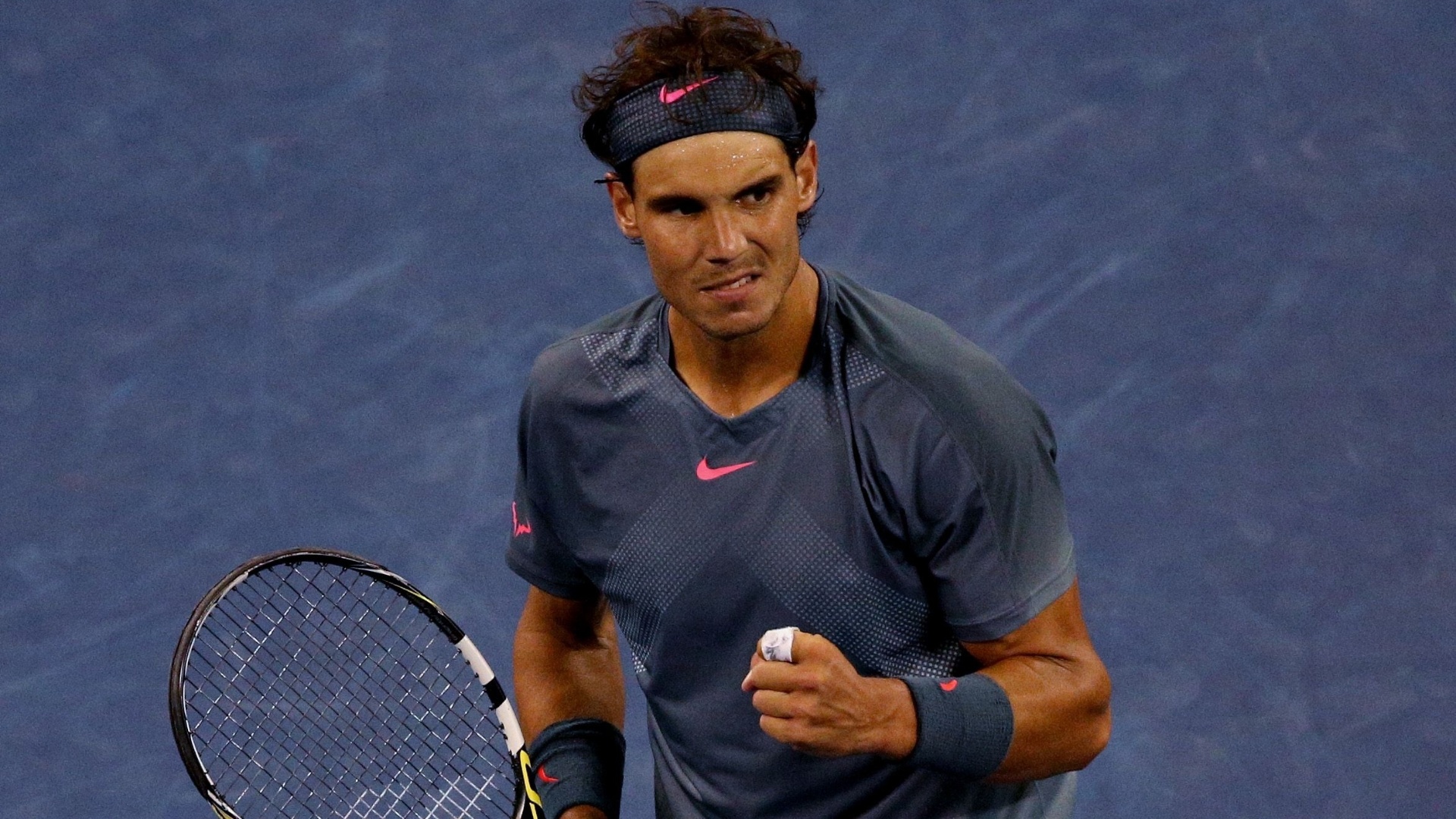 Rafael Nadal comemora ponto na final contra Djokovic no Aberto dos EUA