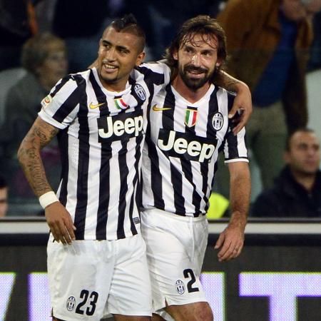 Vidal e Pirlo jogaram juntos com a camisa da Juventus e têm boa relação  - AFP PHOTO / OLIVIER MORIN
