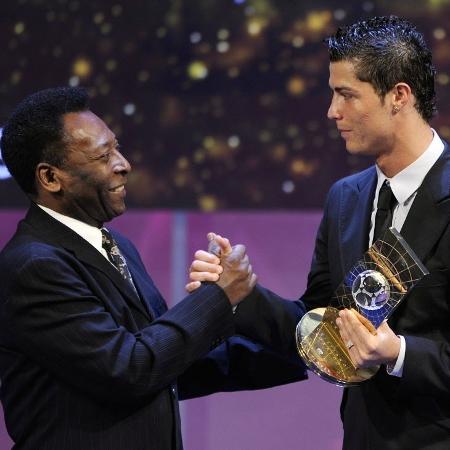 Pelé e Cristiano Ronaldo em 2008 - AFP PHOTO / FABRICE COFFRINI