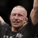 17.nov.2013 - Georges St. Pierre comemora após vencer Johny Hendricks e manter o cinturão dos meio-médios no UFC 167 - AP Photo/Isaac Brekken