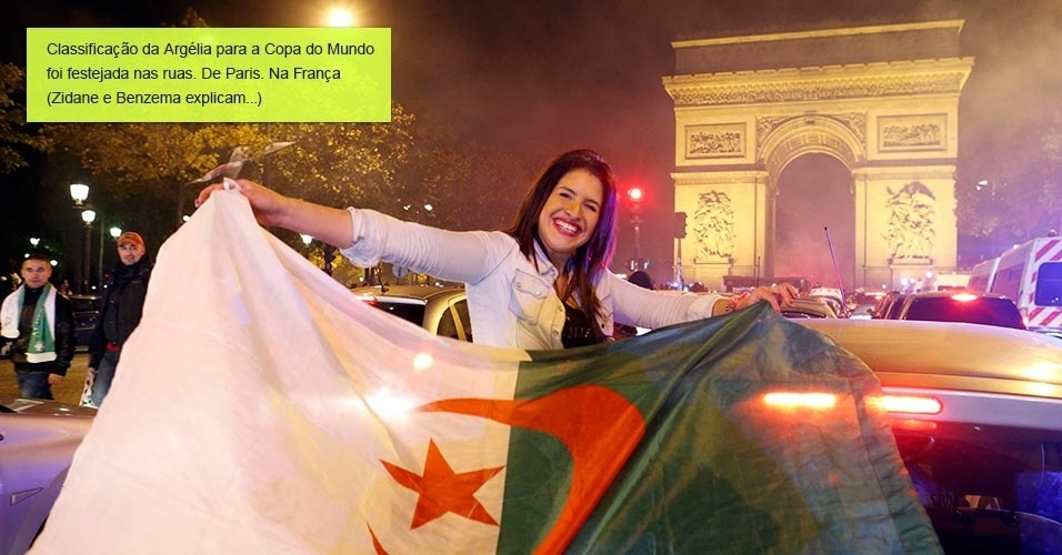 20.Nov.2013 - Torcedora da Argélia comemora classificação para a Copa em Paris