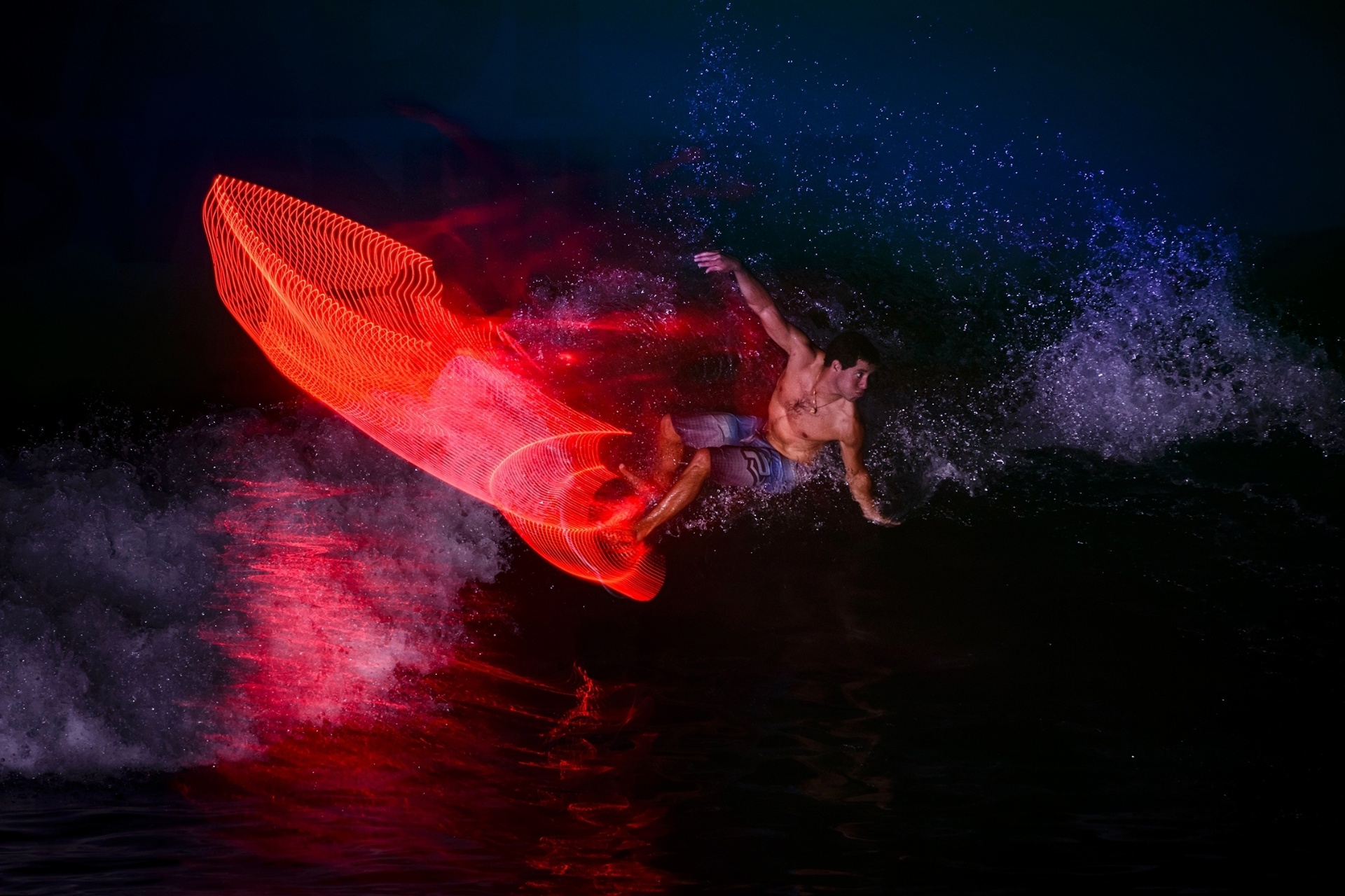 Mineirinho faz ensaio cem piscina de ondas em Abu Dhabi; paulista já bateu Kelly Slater: 'Derrotar o melhor surfista do planeta é a maior sensação que eu poderia ter. Ele é fera. Fico feliz da vida com esse prestigio." - Marcelo Maragni/Red Bull Content Pool