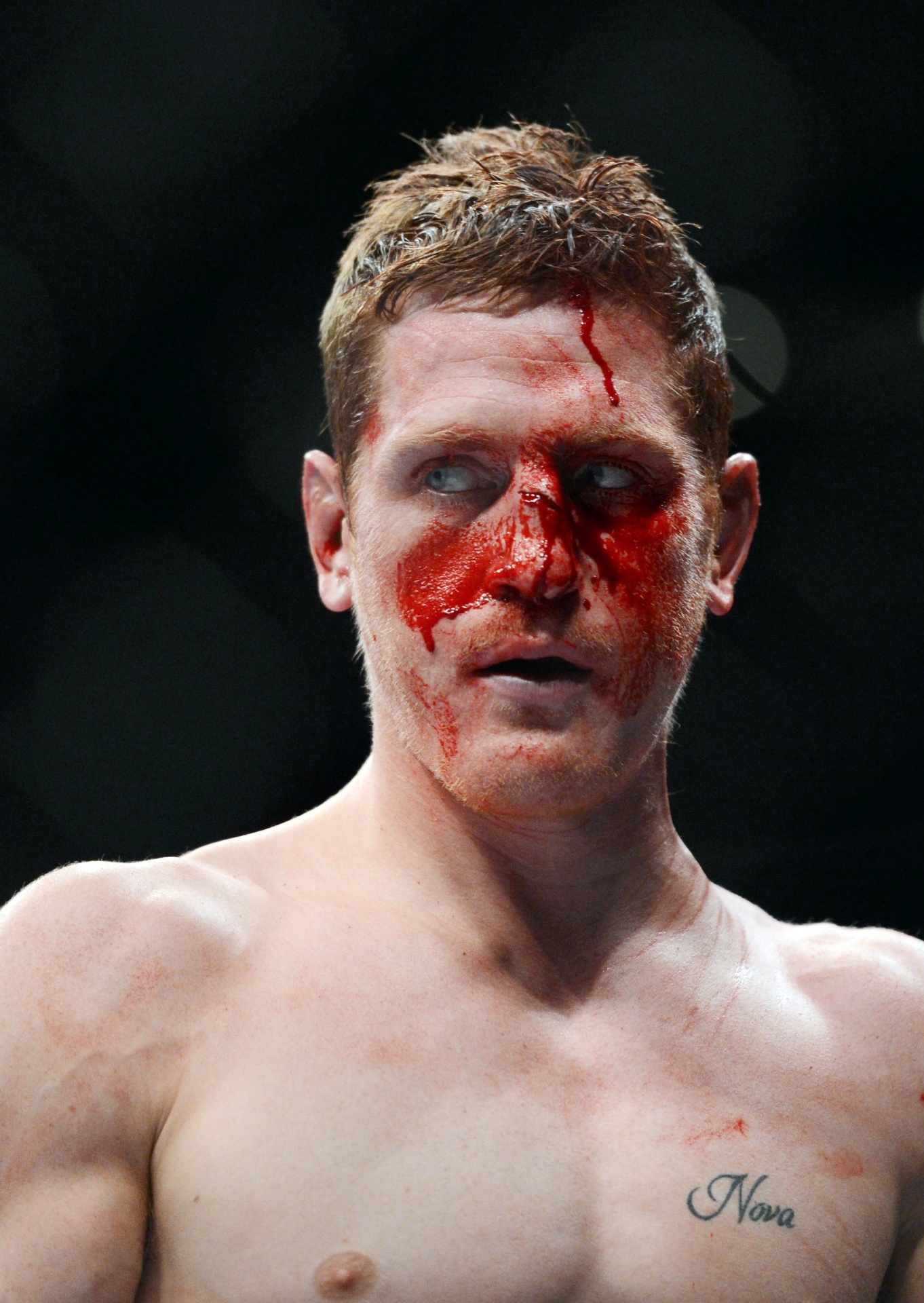 15.dez.2013 - Mac Danzig fica com o rosto sangrando após luta com  Joe Lauzon, no UFC on Fox 9 - Kyle Terada/USA TODAY