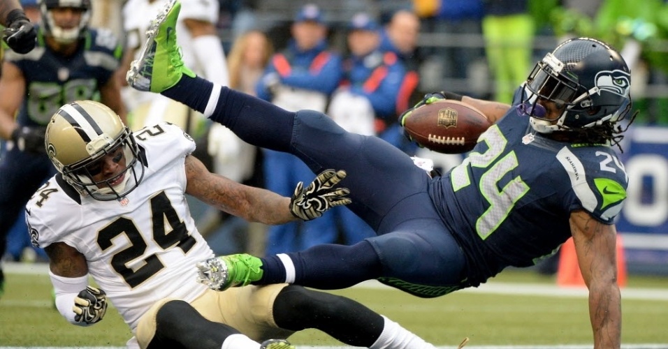 11.jan.2014 - Marshawn Lynch, quarterback do Seattle Seahawks, anota um touchdown contra o New Orleans Saints