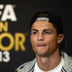 13.jan.2014 - Candidato ao prêmio de melhor do mundo da Fifa, Cristiano Ronaldo participa de coletiva antes da premiação - AFP PHOTO OLIVIER MORIN