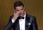 Emocionado ao ganhar a Bola de Ouro, C. Ronaldo agradece Eusébio e Mandela - AFP PHOTO / FABRICE COFFRINI