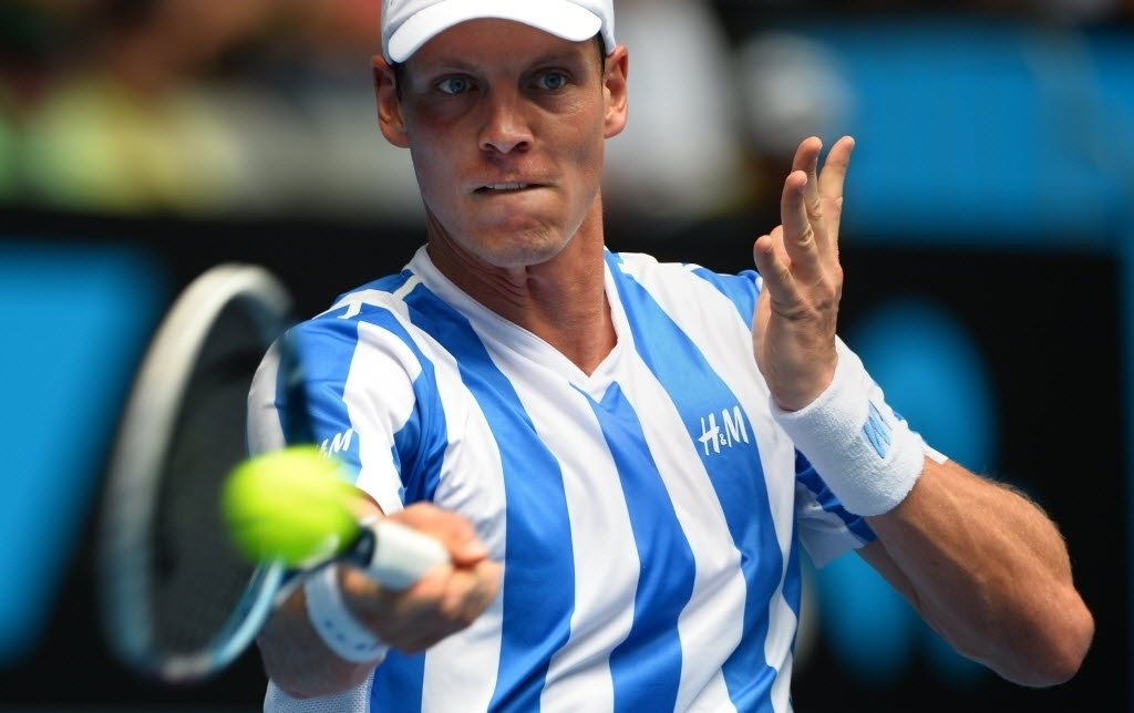 Tomas Berdych em ação contra Kenny De Schepper no Aberto da Austrália - AFP PHOTO / WILLIAM