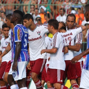 18.01.14 - Jogadores do Flu se abraçam após gol contra o Madureira - Agência Photocamera