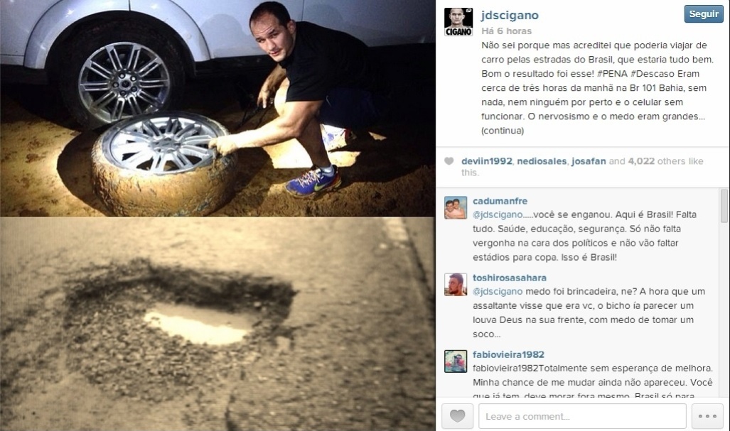 Júnior Cigano troca pneu de carro durante viagem em estrada na Bahia