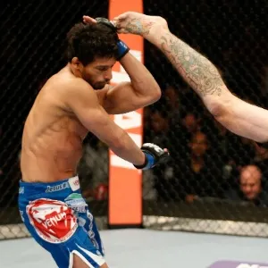 25.jan.2014 - Donald Cerrone chuta o brasileiro Adriano Martins no UFC on FOX 10 - Josh Hedges/Zuffa LLC/Contributor