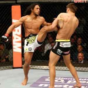 25.jan.2014 - Henderson tenta o chute e é segurado por Thomson no UFC on FOX 10 - Josh Hedges/Zuffa LLC/Contributor