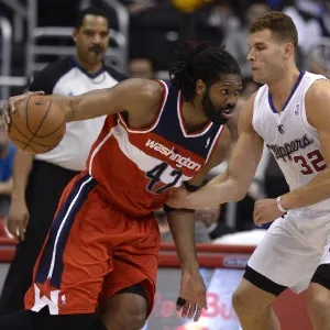 30.jan.2014 - Pivô brasileiro Nenê Hilário não conseguiu evitar a derrota do seu time, o Washington Wizards, para o Los Angeles Clippers na NBA - EFE/Michael Nelson