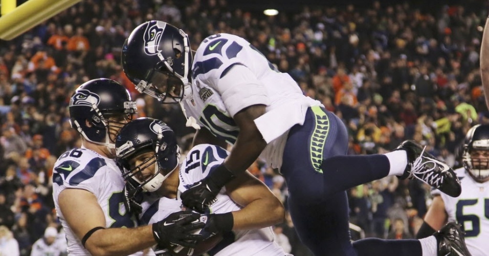 02.fev.2014 - Jogadores do Seattle Seahawks comemoram durante fácil vitória sobre o Denver Broncos no Super Bowl XLVIII