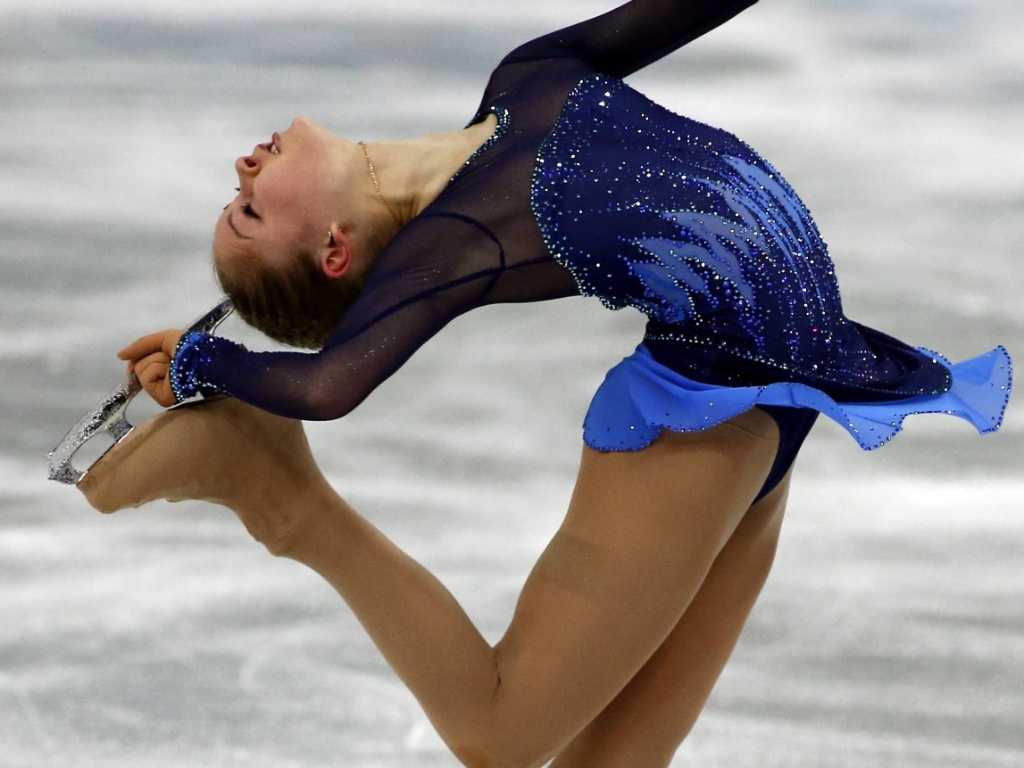 09.02.14 - Russa Yulia Lipnitskaya, de 15 anos, medalha de ouro no último sábado - EFE/EPA/BARBARA WALTON