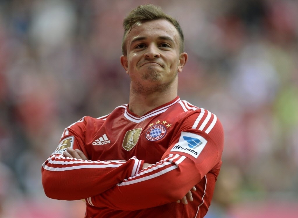 Xherdan Shaqiri esbanja marra ao comemorar gol do Bayern de Munique no Alemão - CHRISTOF STACHE/AFP