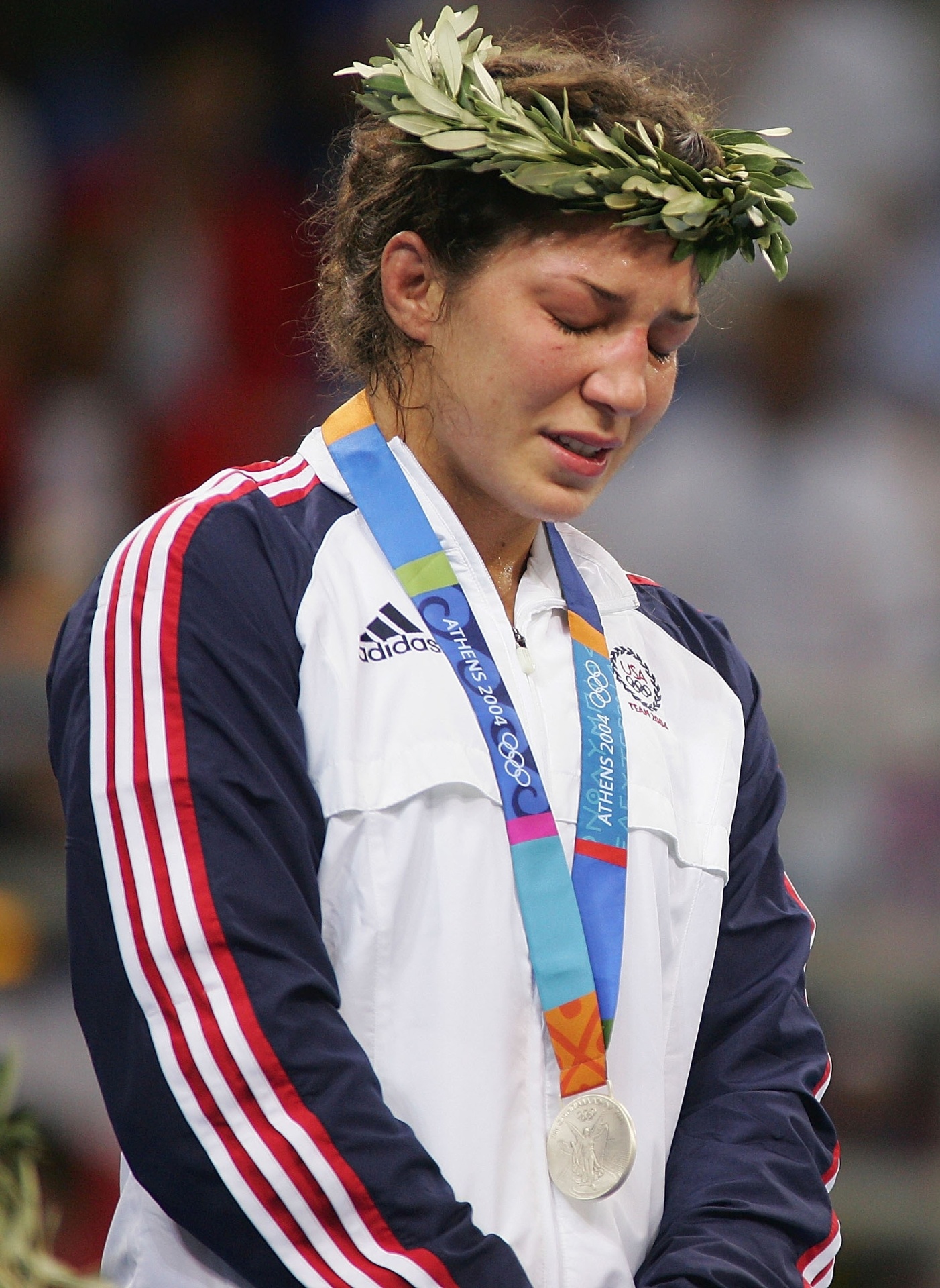 Sara McMann é veterana de 33 anos e há dez conseguiu seu maior feito olímpico. Ela conquistou a prata na luta livre. Como Ronda Rousey, a quem ganhou a chance de desafiar pelo cinturão no UFC 170, acabou trocando o tatame pelo octógono, vencendo todas as suas sete primeiras lutas no MMA. - Getty Images