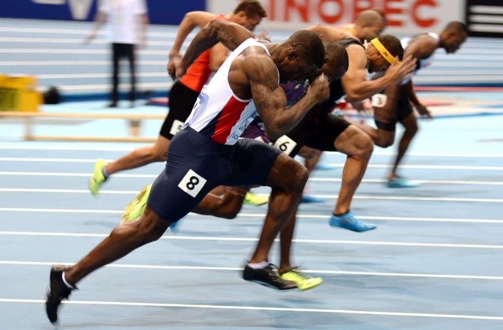 07.mar.2014 - Atleta britânico Dwain Chambers compete nos 60m rasos do mundial de atletismo em pista fechada, na Polônia - BARTLOMIEJ ZBOROWSKI/EFE