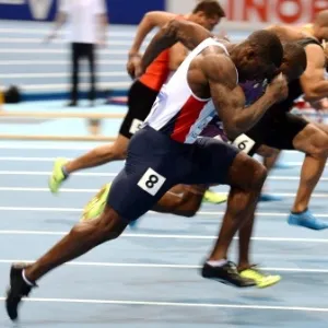 07.mar.2014 - Atleta britânico Dwain Chambers compete nos 60m rasos do mundial de atletismo em pista fechada, na Polônia - BARTLOMIEJ ZBOROWSKI/EFE