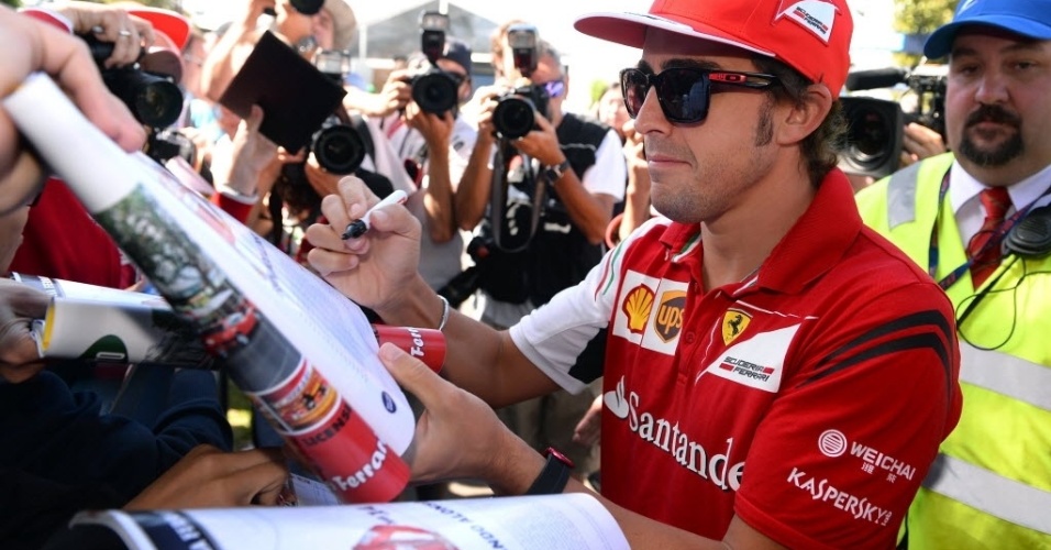 Fernando Alonso terá Kimi Raikkonen como companheiro de Ferrari para a temporada 2014