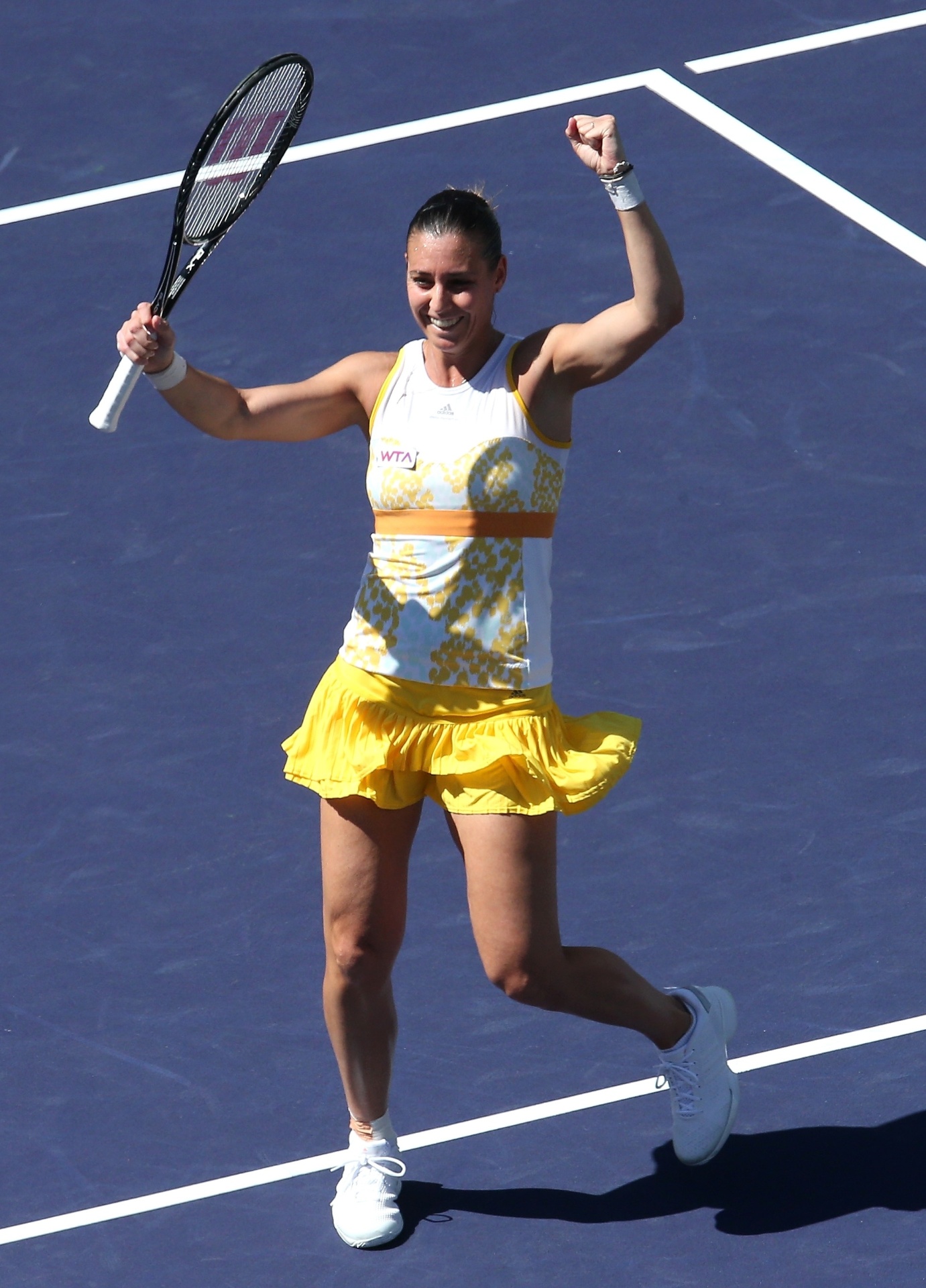 16.mar.2014 - A Italiana Flavia Penneta vence a polonesa Radwanska por 2 sets a 0, com parciais de 6-2 e 6-1 - Stephen Dunn/Getty Images/AFP