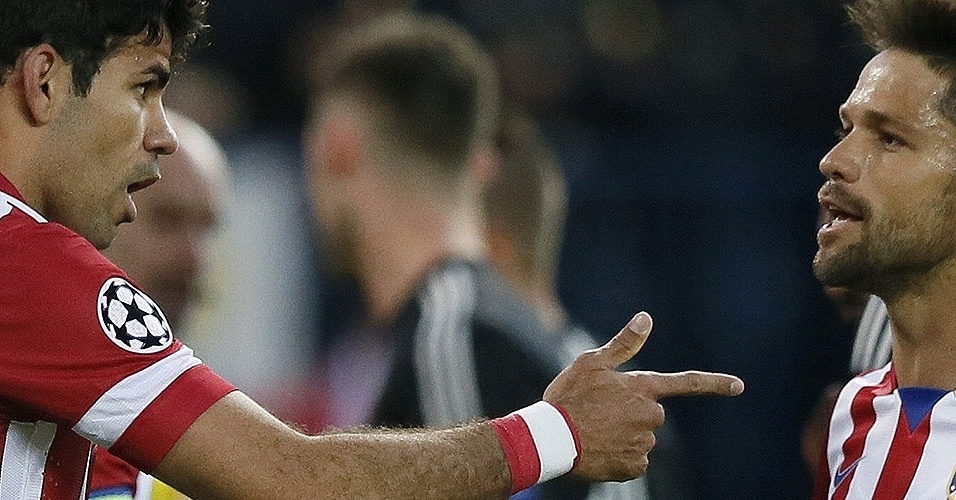 Detalhes: Diego Costa e Diego Ribas, do Atlético de Madri - EFE/Juanjo Martín