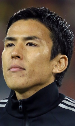 19.nov.2013 - Makoto Hasebe, do Japão, fica perfilado antes do amistoso contra a Bélgica em Bruxelas