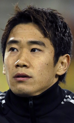 19.nov.2013 - Shinji Kagawa, do Japão, canta o hino nacional antes do amistoso contra a Bélgica em Bruxelas