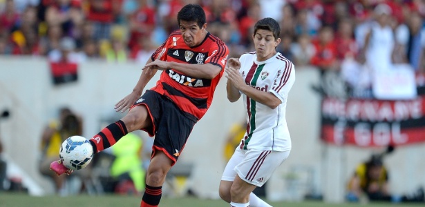 Cáceres e Conca durante o Fla-Flu pelo primeiro turno do Campeonato Brasileiro - Alexandre Loureiro/Getty Images