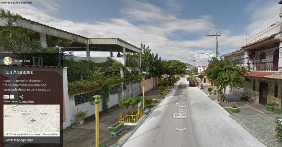 Rua Ararapira, no Rio, com vasos e postes pintados em verde-amarelo