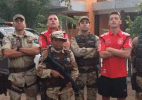 Faltou só a farda: Podolski e Özil com militares - Reprodução