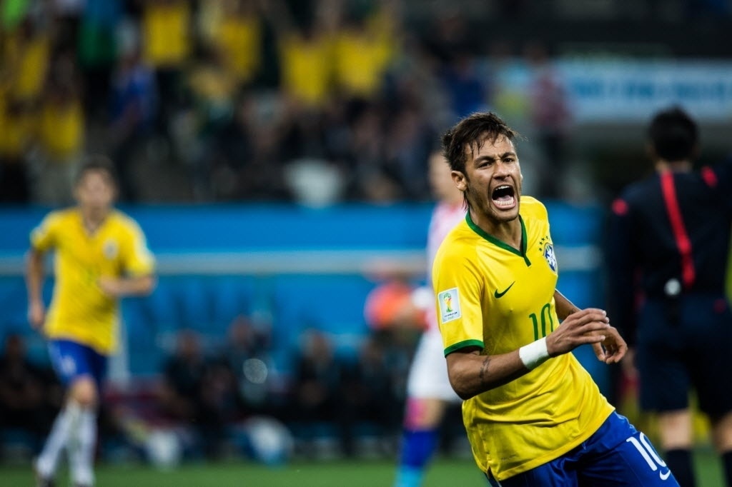 12.jun.2014 - Autor de dois gols, Neymar foi um dos destaques da seleção brasileira na vitória sobre a Croácia, de virada, por 3 a 1, na abertura da Copa do Mundo
