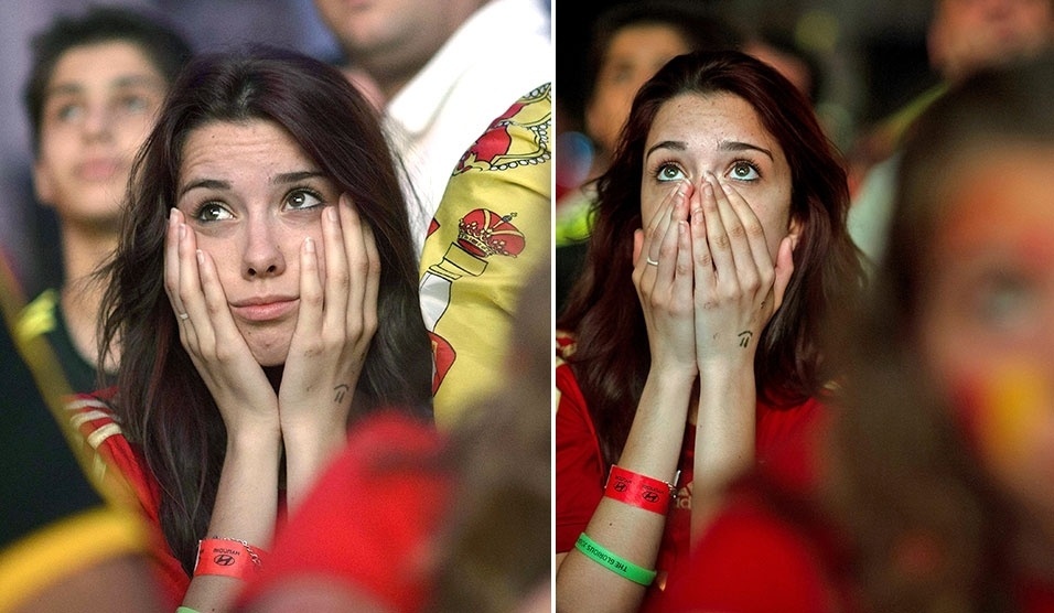 13.jun.2014 - Torcedora espanhola sofre com a goleada aplicada pela Holanda na estreia das seleções na Copa
