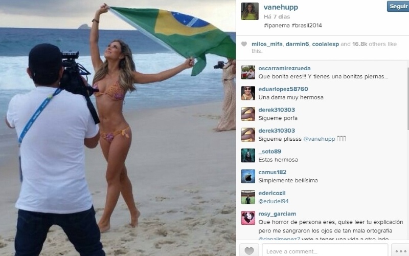 Vanessa filma de biquíni e bandeira do Brasil em praia do Rio de Janeiro
