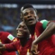 21.jun.2014 - Jogadores de Gana dançam em campo após Asamoah Gyan virar o jogo na partida contra a Alemanha - Laurence Griffiths/Getty Images