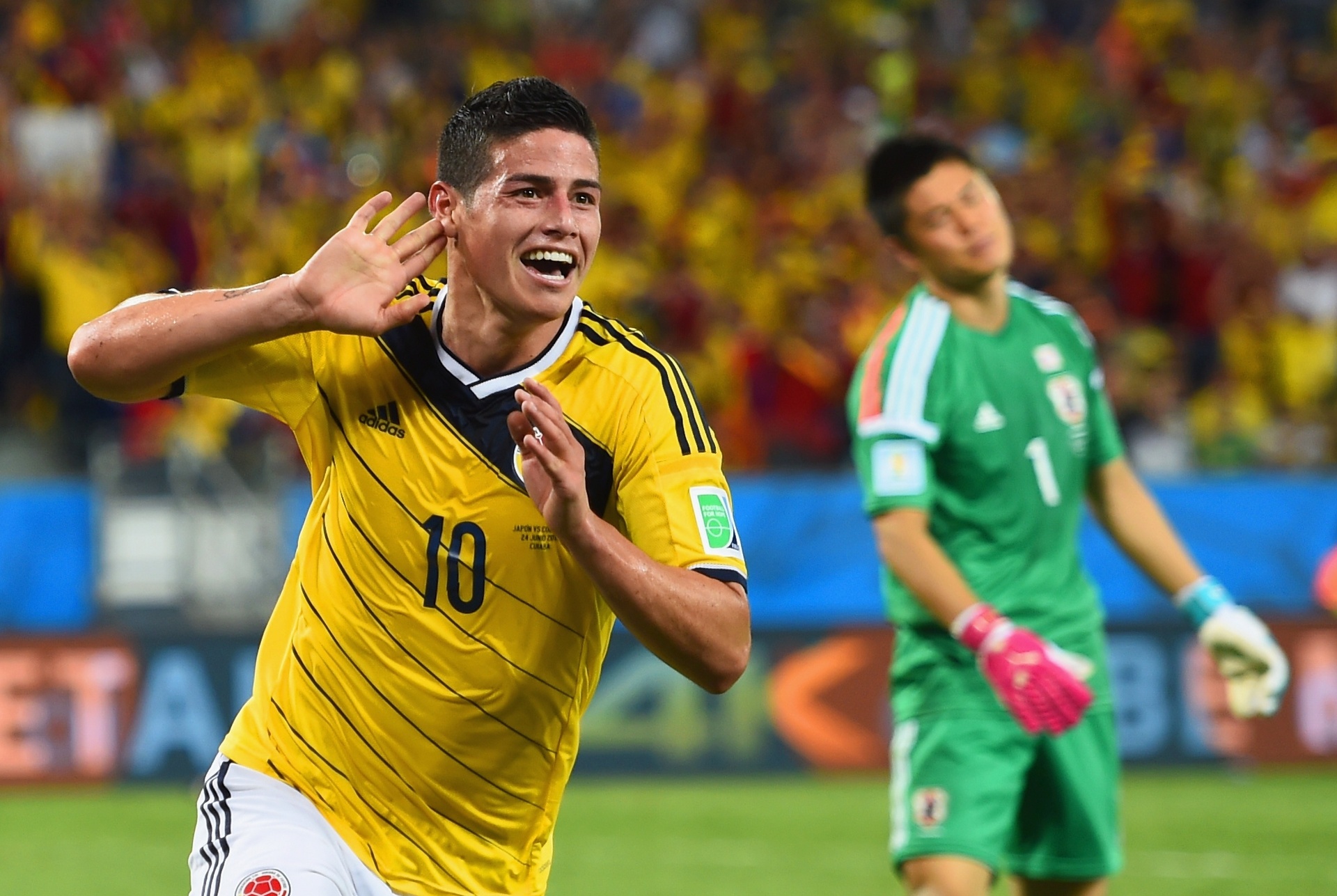 24.jun.2014 - James Rodriguez, da Colômbia, comemora após marcar o quarto gol na vitória sobre o Japão na Arena Pantanal - undefined