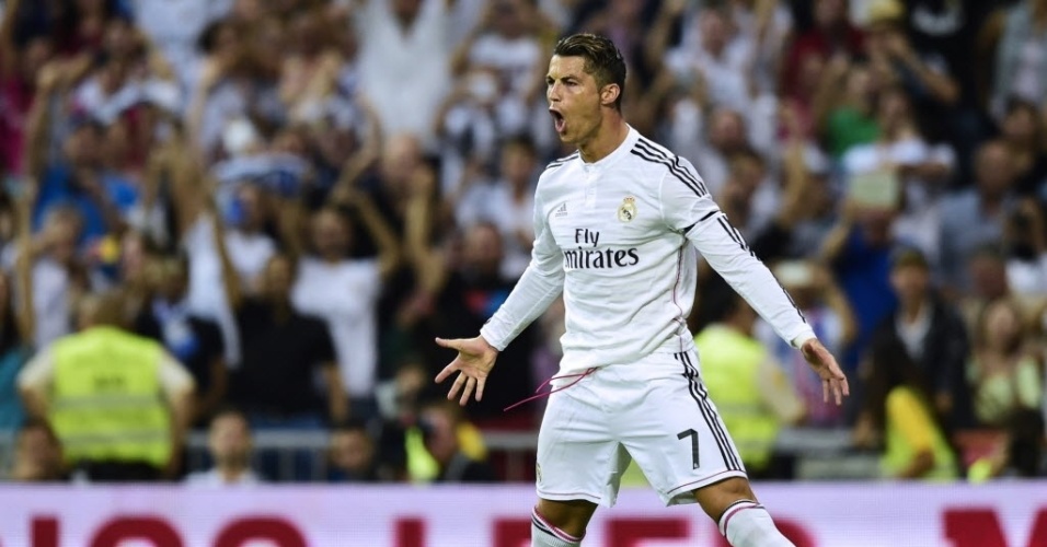 13.set.2014 - Cristiano Ronaldo comemora após marcar de pênalti Real Madrid contra o Atlético de Madri no Espanhol