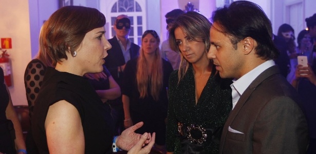 Claire Williams conversa com Massa e sua esposa, Raffaela - Reinaldo Canato/UOL