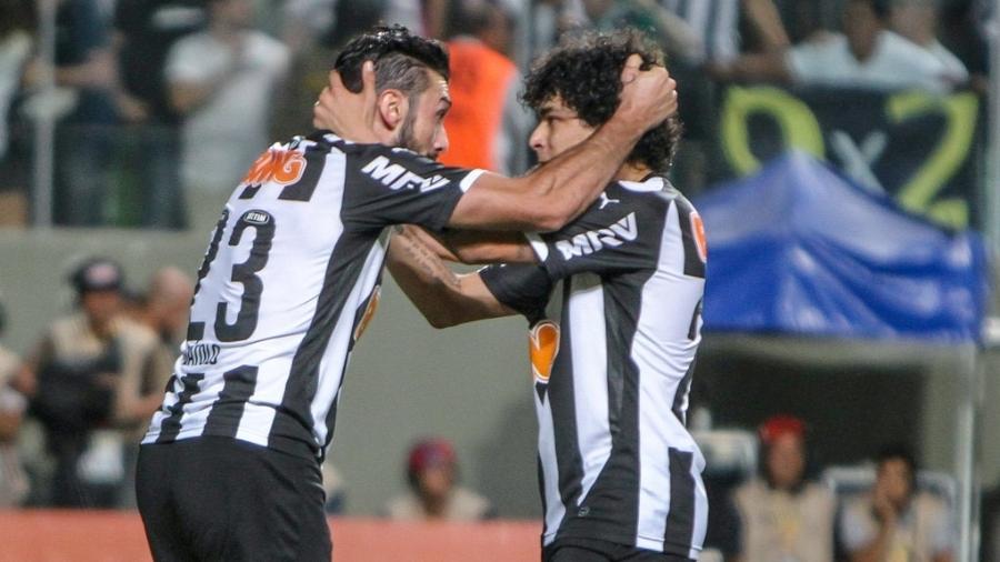 Dátolo e Luan, do Atlético-MG, em final reprisada diante do rival Cruzeiro - Bruno Cantini/Site do Atlético-MG
