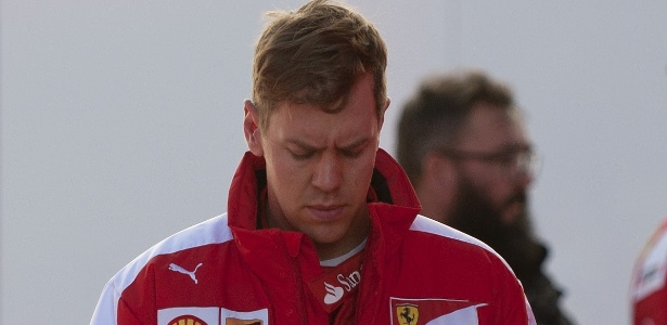 Sebastian Vettel é famoso por trocar de desenho de capacete constantemente - AFP PHOTO/ JORGE GUERRERO