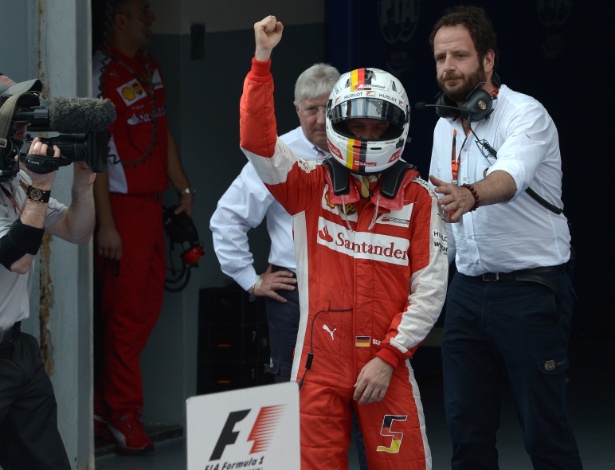 Vettel ganhou a primeira da Ferrari desde maio de 2013 - MOHD RASFAN/AFP