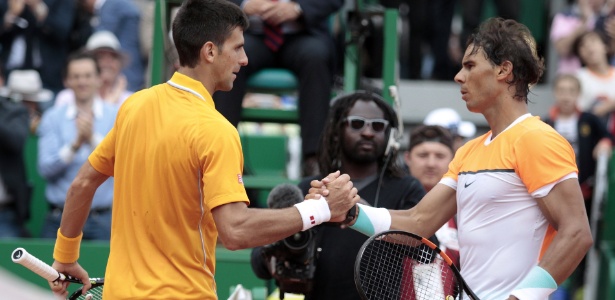 Djokovic e Nadal farão um duelo prematuro no saibro de Roland Garros -  AFP PHOTO / JEAN-CHRISTOPHE MAGNENET 
