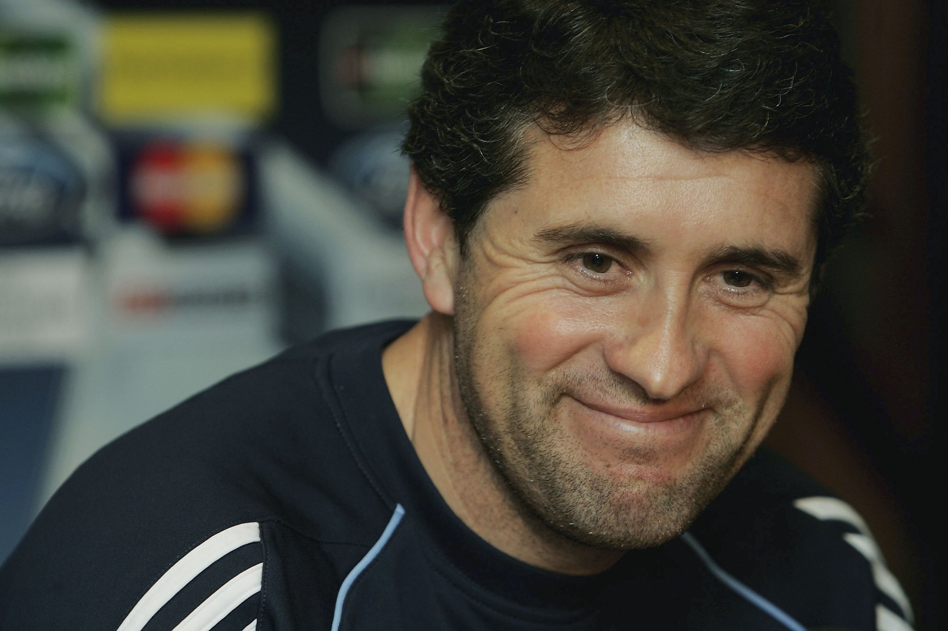 Juan Ramón López Caro sorri durante entrevista coletiva do Real Madrid - Christopher Lee/Equipa