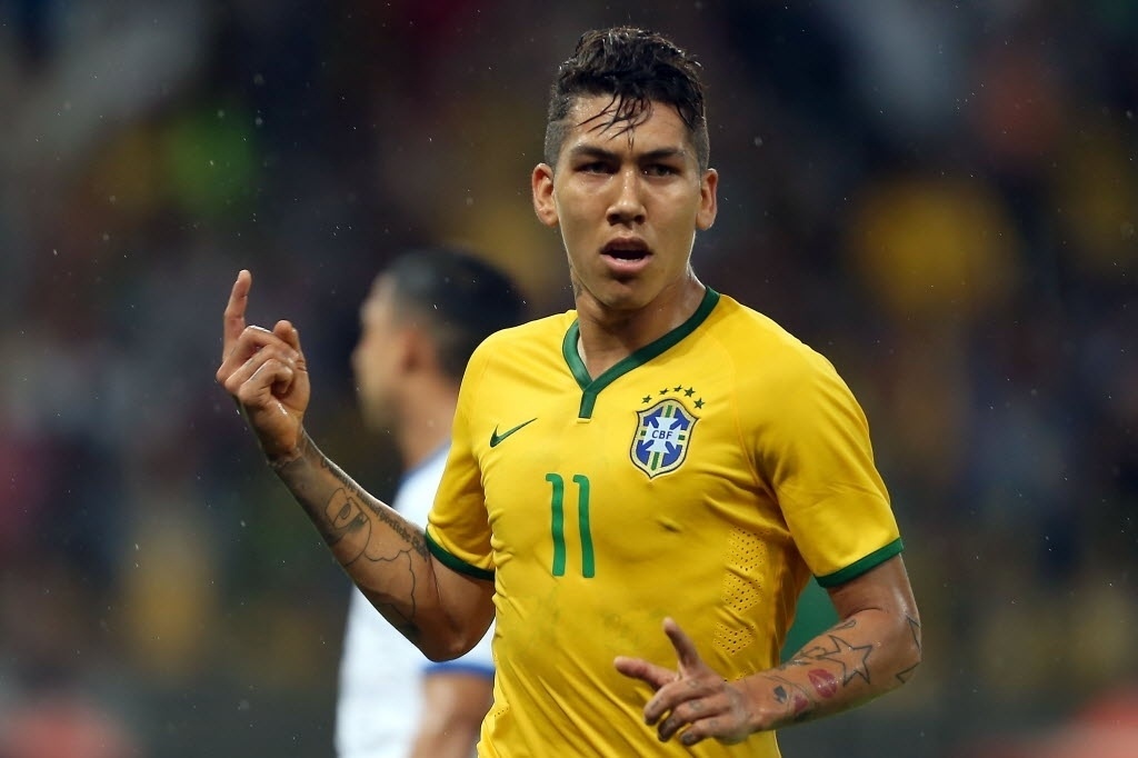 Firmino comemora primeiro gol do Brasil contra Honduras - AFP PHOTO / Jefferson BERNARDES