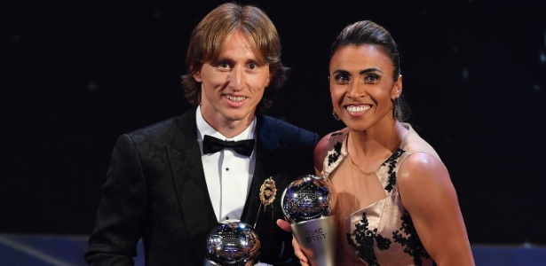 Luka Modric e Marta foram eleitos como melhores jogadores do mundo - STANSALL / AFP